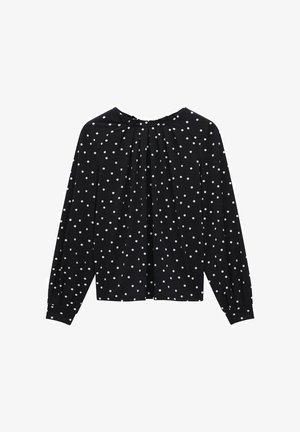 Sort langærmet bluse med hvide prikker, der har en plisseret halsudskæring og fitted manchetter. Blødt stof med en glat tekstur.
