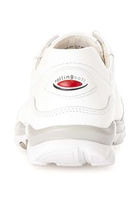 White leather shoe with a padded heel, featuring a gray rubber sole. "Rollingsoft" logo in red on the back. Smooth texture and rounded shape.