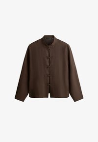 Kijelölve, mottled light brown