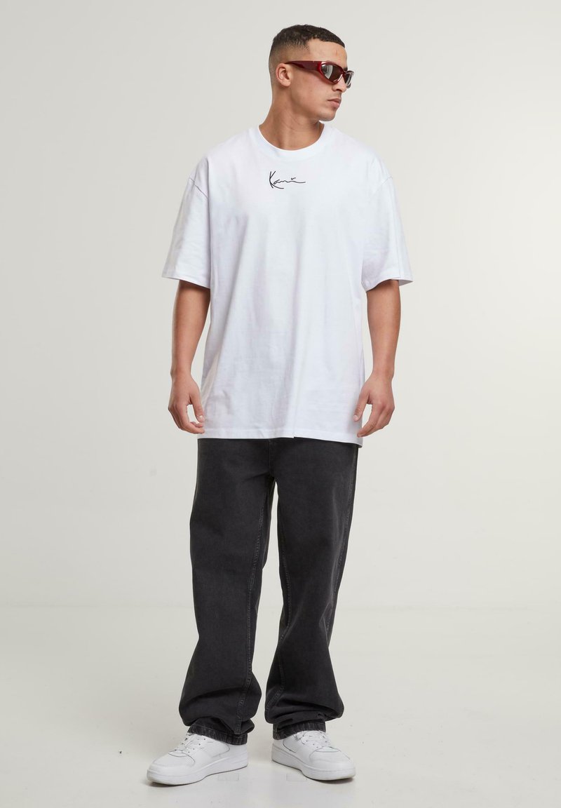 Karl Kani - 3 PACK - Basic T-shirt - white black beige, Enlarge