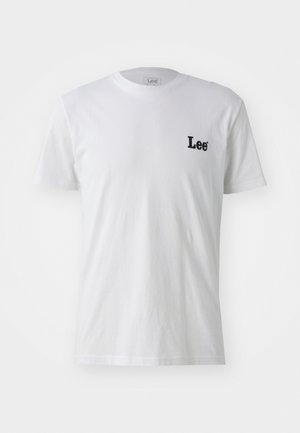 Camiseta de algodón blanca con cuello redondo, que presenta un pequeño logo negro en el lado izquierdo del pecho. Mangas cortas, textura suave, corte estándar.