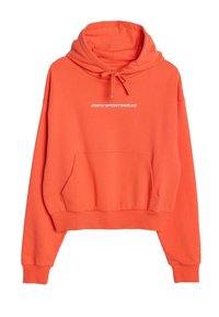 Oranje cropped hoodie van zachte stof, met een capuchon met trekkoord, een voorzak en witte logotekst in een contrasterende kleur.