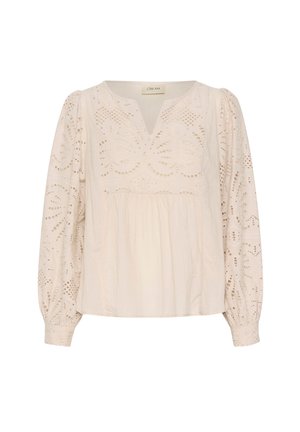 Cream blouse with a V-neckline, intricate cut-out patterns, long puffed sleeves, and a loose fit. Made from lightweight, textured fabric.