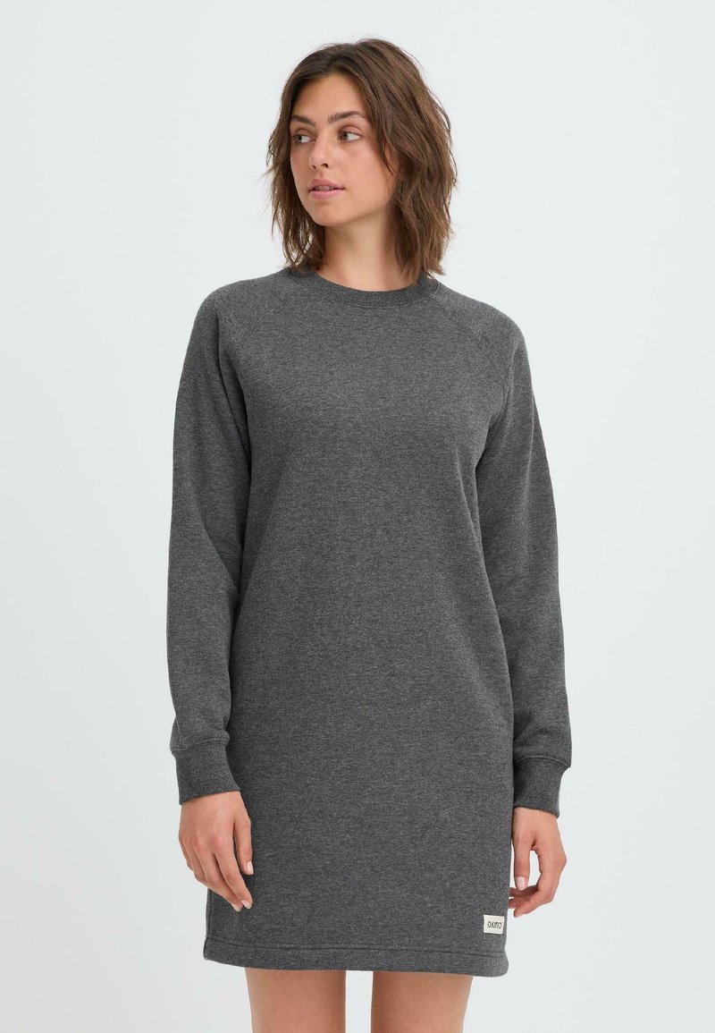 Gray fleece dress with long raglan sleeves, crew neckline, and side seam label; features a relaxed fit and soft texture.