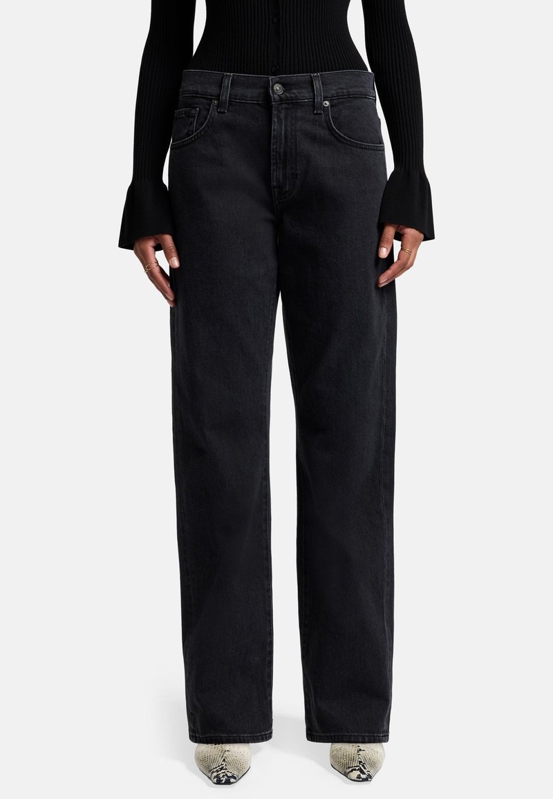 Jeans neri a gamba larga in denim resistente, caratterizzati da un classico design a cinque tasche e chiusura con bottone, che mettono in risalto una silhouette rilassata.
