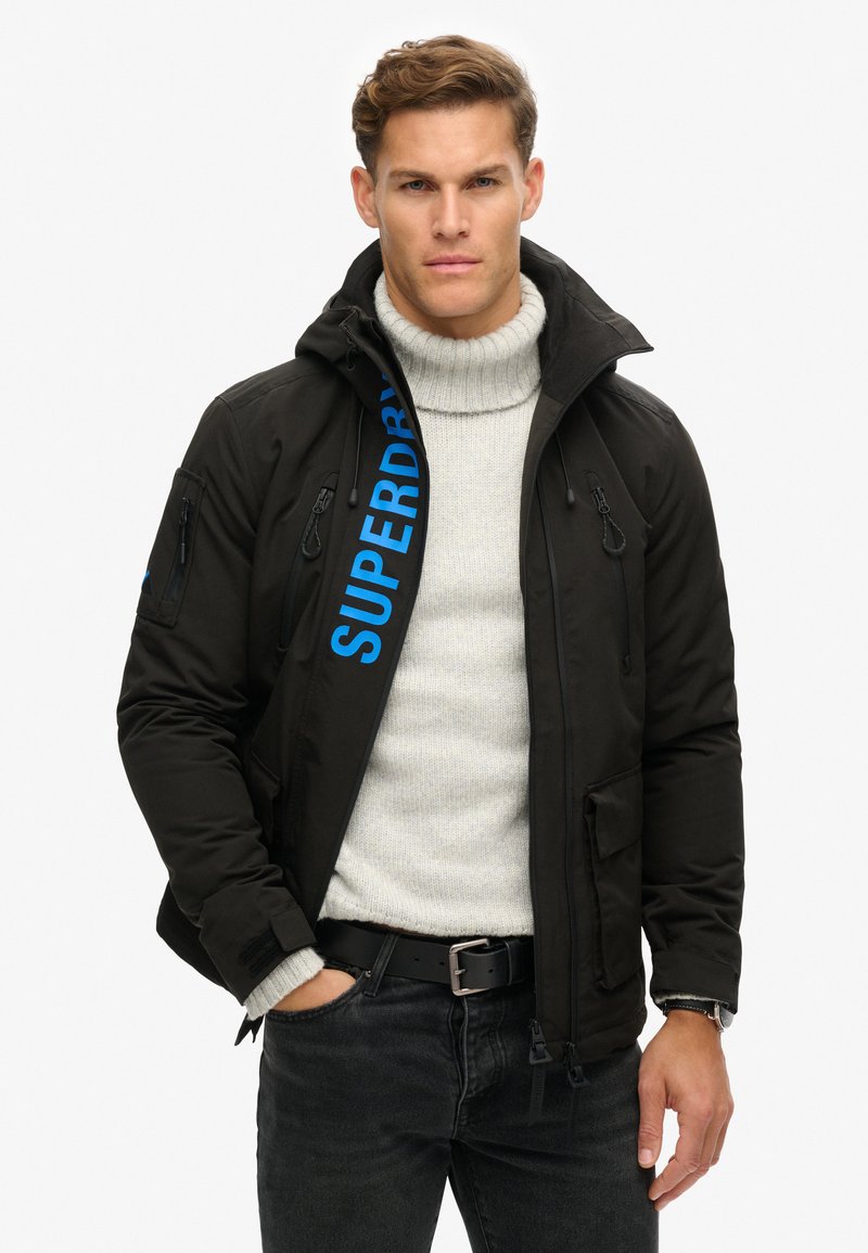 Superdry & Co ULTIMATE SD CHEATER - Chaqueta de entretiempo - black blue bay