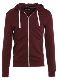 Sudadera con cremallera en burdeos hecha de suave algodón, con un bolsillo frontal, cordones blancos y puños y dobladillo acanalados.
