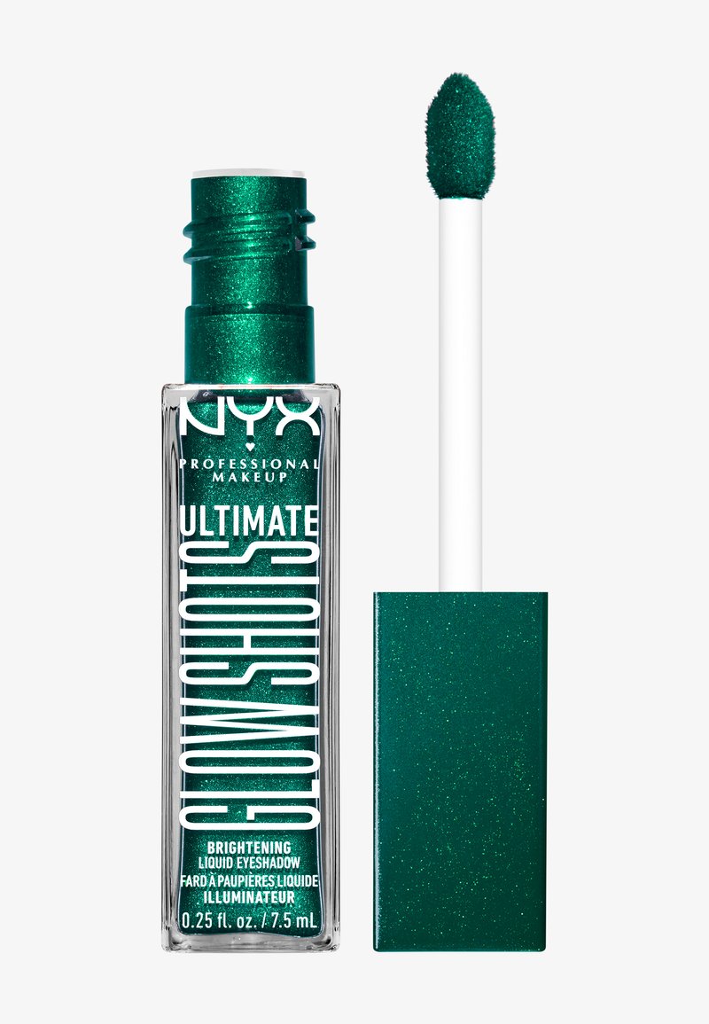 Fard à paupières liquide dans un tube transparent, présentant une couleur verte vive avec des paillettes. Applicateur inclus, le capuchon est de couleur verte étincelante.