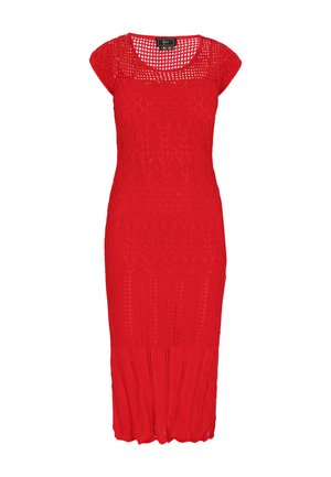 Punane kudumkleit lühikeste kapuutsikatega, ruudu kaelus ja keha lähedane siluett. Omab keerukaid mustreid ja ribaga äärist.