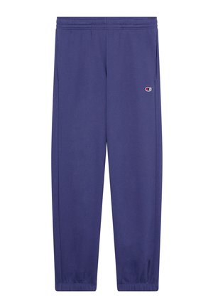 Pantaloni da jogging blu con vita elastica, dotati di tasche laterali e logo Champion sulla coscia sinistra, polsini elasticizzati alla caviglia.