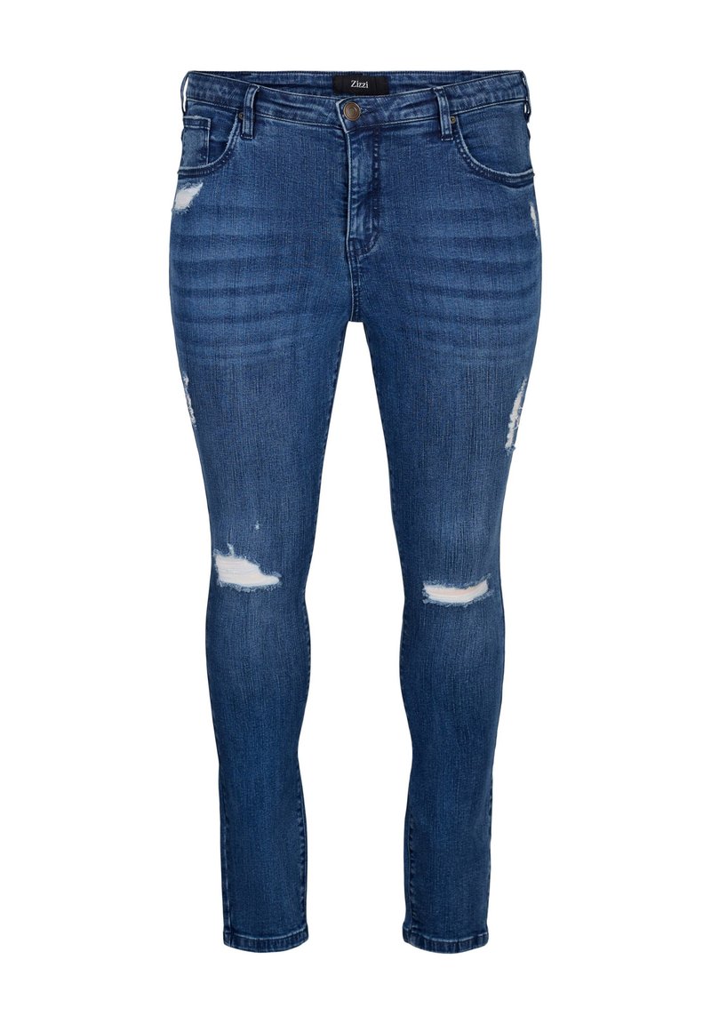 Tamno plave skinny traperice s pocepanim rupama na koljenima, dizajn s pet džepova, zatvaranje na patentni zatvarač i glatka denim tekstura.