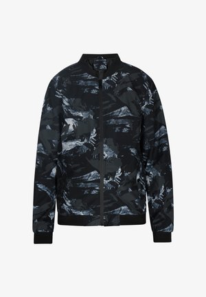 Zwarte bomberjack met een geometrisch abstract patroon in grijstinten en blauw. Voorzien van een rits aan de voorkant en ribbels bij de mouwen en onderkant.