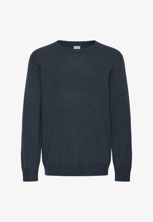 Tumši zilas krāsas džemperis ar apaļu kakla izgriezumu, izgatavots no mīksta auduma, ar ribotām piedurknēm un apakšmalu, ar bezšuvju dizainu bez redzamām rakstām un piederumiem.