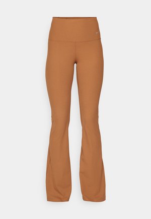 Barna bordás, harangszárú leggings, magas derékú; rugalmas anyagból készült; az elején egy kis logó található.