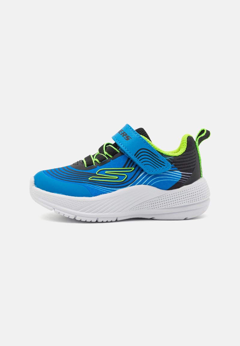 Blue and black athletic shoe with green accents, a textured surface, lace-up design, and a Velcro strap, featuring a chunky white sole.