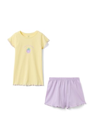 Gelbes kurzärmeliges Oberteil mit gewellten Kanten und Weintraubenmotiv, kombiniert mit hellvioletten Shorts mit elastischem Bund und gewellten Säumen.