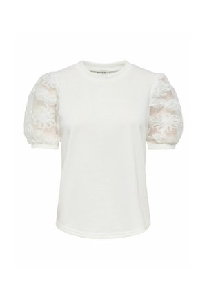 Blouse blanche à manches courtes avec encolure ronde et manches bouffantes transparentes ornées de détails de broderie florale.