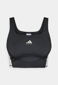 Svart sportsbh med hvite sidestriper, firkantet utringning og sentrert Adidas Basketball-logo på brystet.
