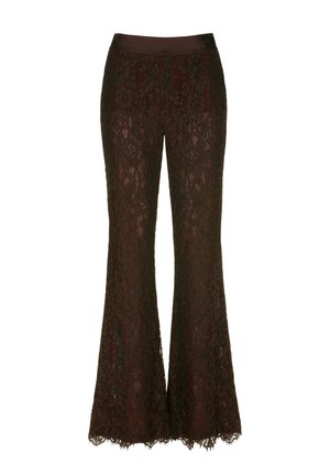 Pantalons évasés en dentelle noire avec une taille lisse, présentant des motifs floraux complexes et des bords festonnés à l'ourlet. Design transparent.