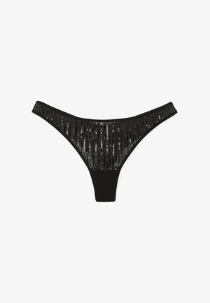 Perizoma nero con pannello frontale di paillettes a strisce verticali. Tessuto liscio con decorazioni lucide a contrasto.