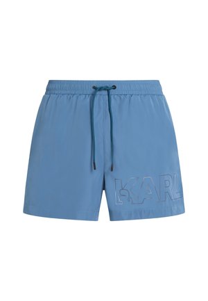 Pantalones de baño azules confeccionados en tela ligera, con una cintura elástica y cordón de ajuste, y un gran logo 'KARL' en el lateral.