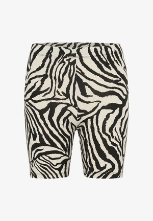 Black and white zebra print short leggings with a smooth texture, elastic waistband, and fitted design, suitable for casual wear or exercise.