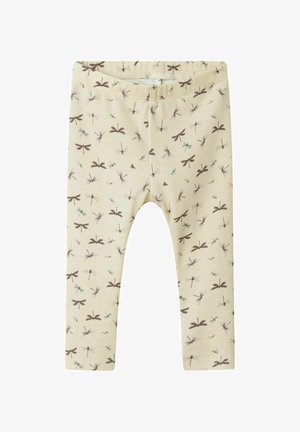 Crème leggings gemaakt van zachte stof, met een herhaald patroon van libellen in paars, bruin en blauw. Rekbare tailleband voor comfort.