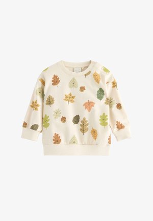 Krämfärgad sweatshirt med ett lövmönster i gröna, bruna och orange nyanser. Ribbad mudd och halsringning, med tryckknappsstängning på ena axeln.