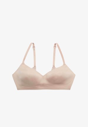 Naadloze nude beige bh met verstelbare dunne bandjes en gevormde cups, ontworpen voor comfort en minimale zichtbaarheid onder kleding.