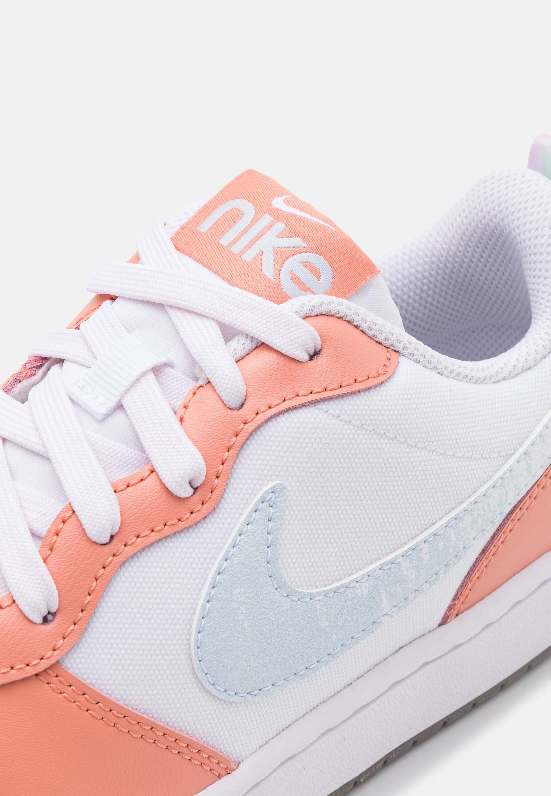nike court royale trainers in aura & white