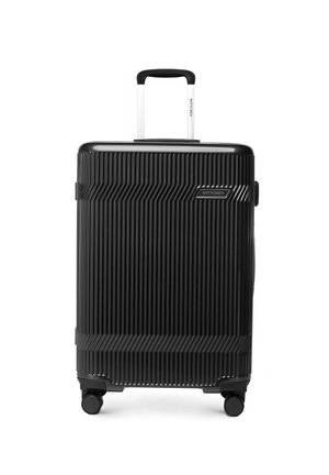 Valigia rigida nera con scanalature verticali, quattro ruote e manico telescopico argento, con targhetta logo "WITTCHEN".