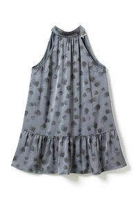 Suknja bez rukava, sive boje, s visokim ovratnikom, crnim apstraktnim točkama i nabranim rubom, položena ravno na bijeloj pozadini.