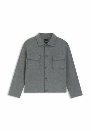 Grijze jas van een wolmix met een kraag, knoopsluiting en twee borstzakken. Heeft een comfortabele pasvorm en een gestructureerde stof.