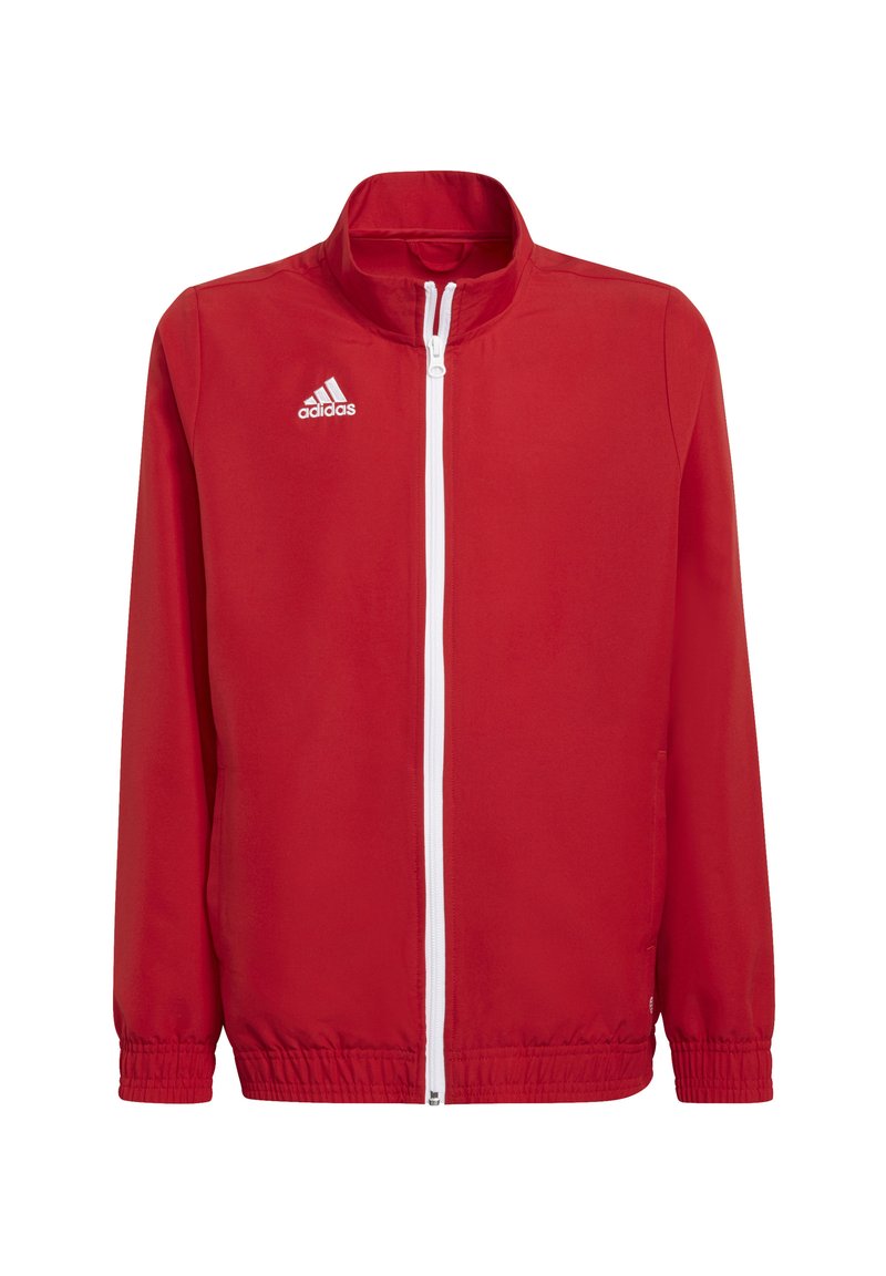 Rode tracksuitjack met hoge kraag, rits aan de voorkant, elastische manchetten en onderkant. Logo aan de linkerkant. Glad stoffen textuur, ontworpen voor actieve kleding.
