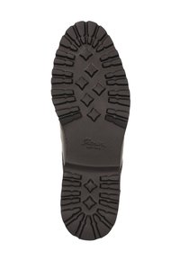 Černá gumová podrážka obuvi s hlubokými vzory, vybavená diamantovým vzorem pro trakci a hladkou středovou plochou označenou "Fiorucci".