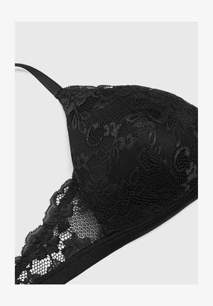 Zwarte kant bralette met bloemenpatronen, gladde stof, verstelbare banden en een zachte onderband voor comfort.