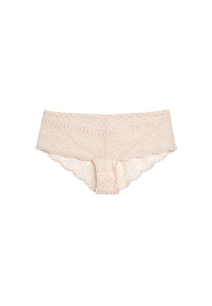 Culottes hippie pour femmes en dentelle beige clair avec motifs floraux et géométriques, bords en forme d'ondulations et taille basse.