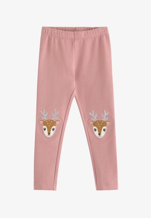 Leggings in cotone rosa con vestibilità aderente. Presentano applicazioni di volti di cervo con corna su entrambe le gambe inferiori. Texture morbida e vita elastica.