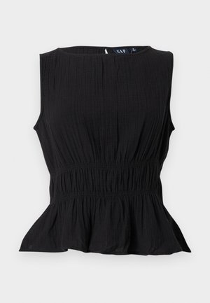 Blouse noire sans manches en tissu texturé avec taille froncée et ourlet péplum évasé, encolure ronde et fermeture éclair à bouton en forme d'œillet au dos.