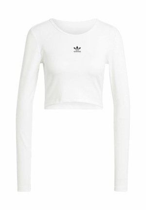 White cropped long-sleeve shirt made of ribbed cotton. Features a round neck and small black Adidas logo on the chest.