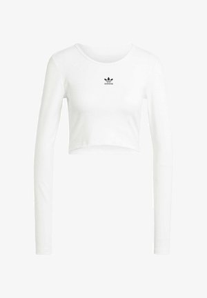 Witte, korte lange mouw shirt van ribstof katoen. Heeft een ronde hals en een klein zwart Adidas-logo op de borst.