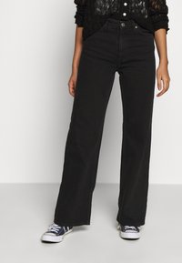 Monki Straight leg -farkut - black