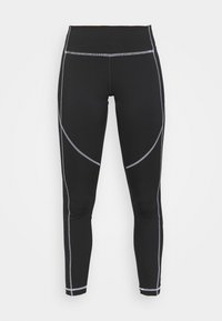 Czarne legginsy wykonane z elastycznego materiału, z kontrastującymi szarymi szwami i zakrzywionymi panelami po bokach.