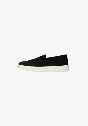 Black slip-on shoe with a smooth suede upper, white rubber sole, streamlined design, and subtle stitching detail along the edges.