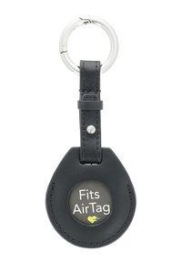 Black leather keychain holder for AirTag, featuring a circular design with a printed “Fits AirTag” logo and a silver metal keyring attachment.