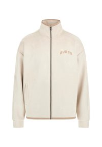 Beige színű zipzáras fleece kabát állógallérral, oldalsó zsebekkel, bordázott mandzsettákkal és a bal mellkason található "GUESS" logóval.