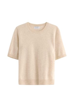 Maglione beige a maniche corte realizzato in materiale morbido, con scollo rotondo e orlo a costine. Design semplice e senza cuciture con dettagli minimi.