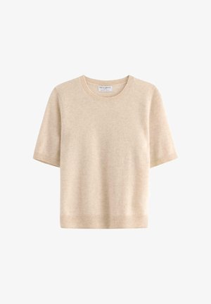 Maglione beige a maniche corte realizzato in materiale morbido, con scollo rotondo e orlo a costine. Design semplice e senza cuciture con dettagli minimi.