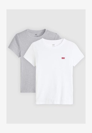 Kaks lühikese varrukaga T-särki, üks hall ja teine valge, valmistatud pehmest puuvillast. Igal särgil on rinna peal väike punane Levi'si logo.
