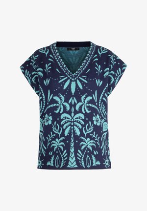 Temno modra pletena majica brez rokavov z V-izrezom, okrašena s svetlo modrimi tropskimi vzorci palm in cvetja.